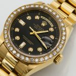 gold and silver round analog watch